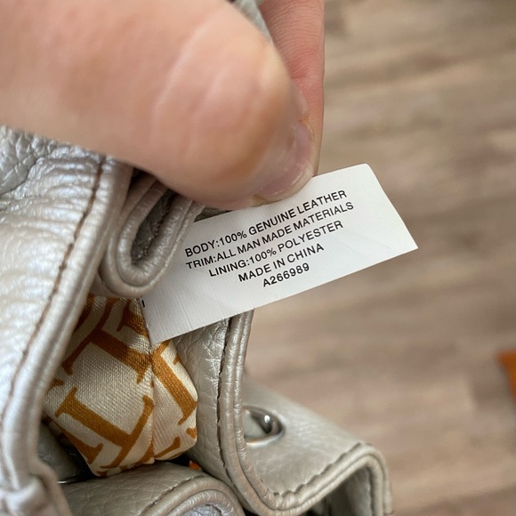 Tignanello leather crossbody purse with tassels. - Picture 12 of 13